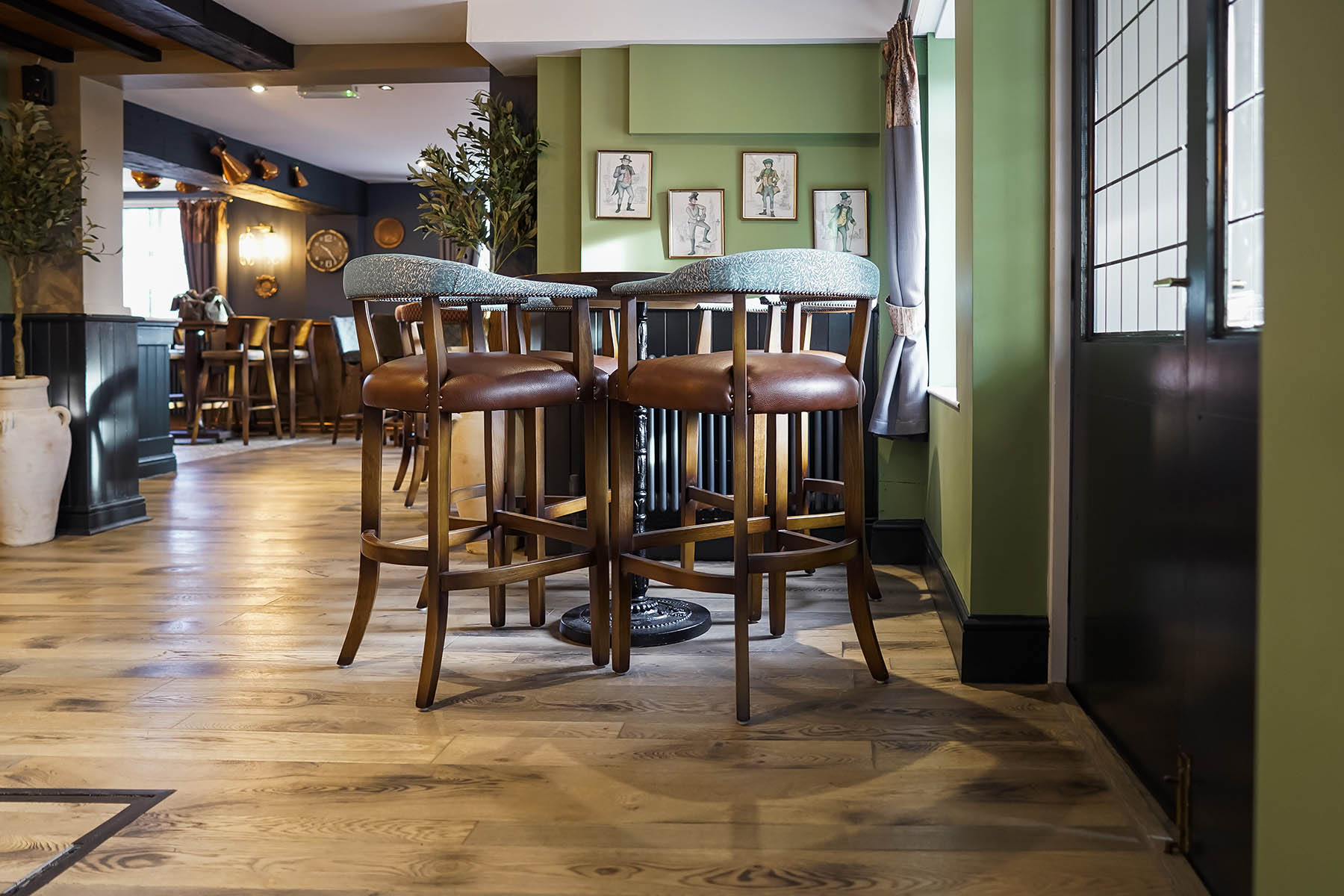 Warm, character-rich wood flooring for a dog-friendly pub.