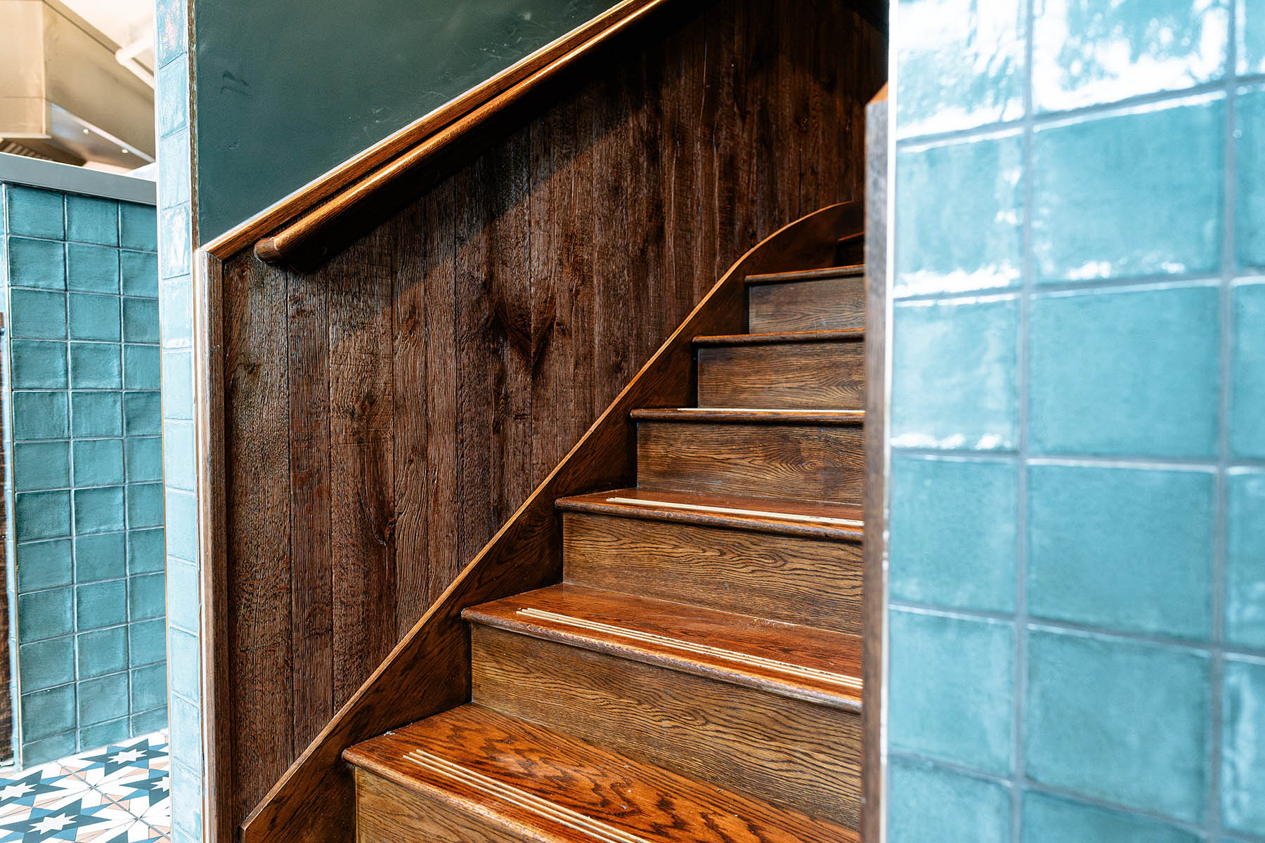 JackEvie bespoke wall cladding integrated into staircase design