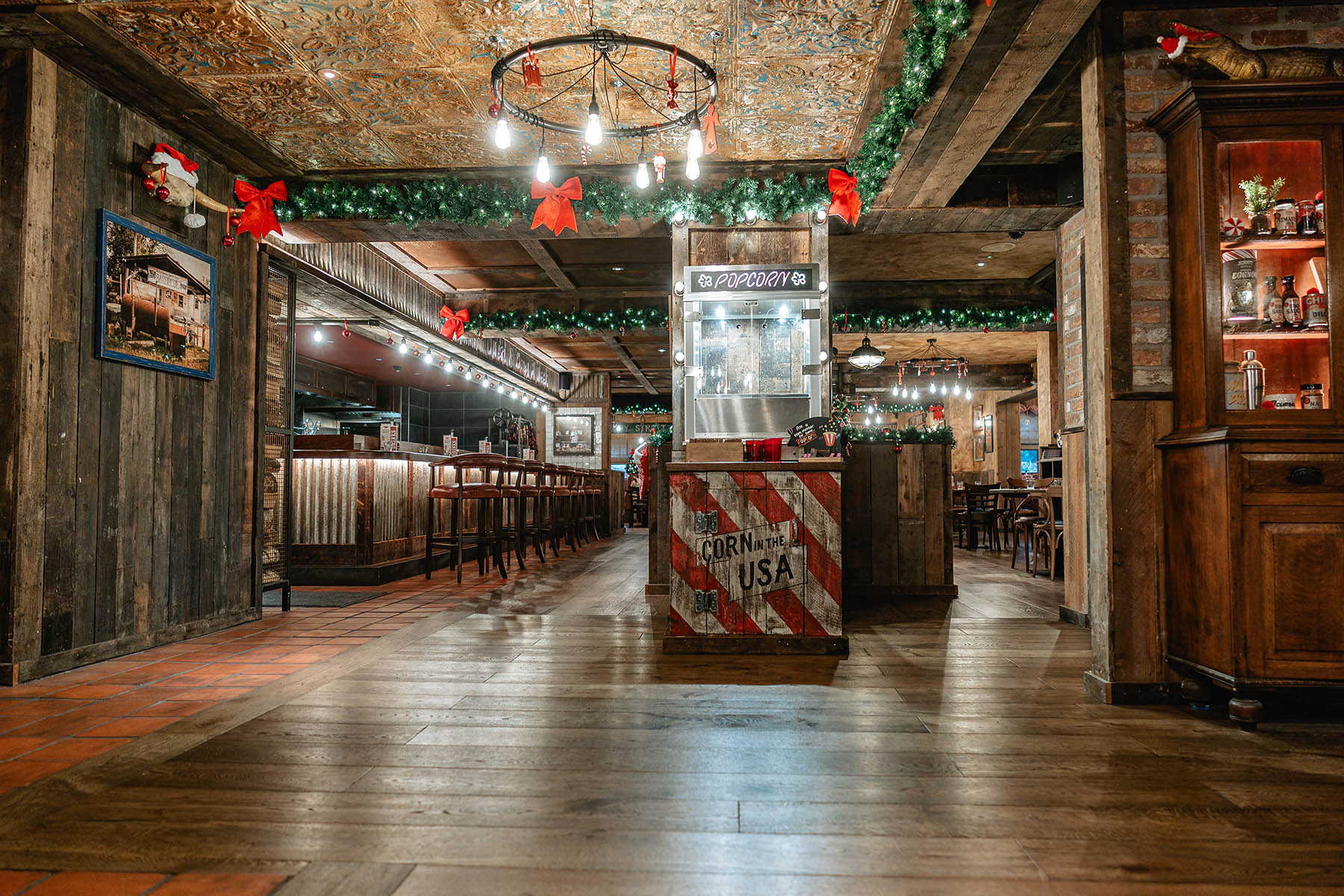 Wide plank flooring in Hickory’s Smokehouse dining area.