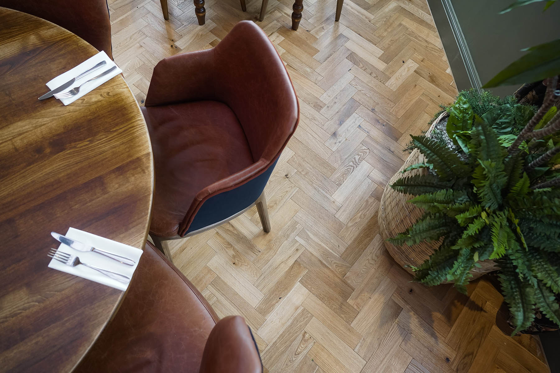 Herringbone oak flooring at The Hornsmill, Chester.