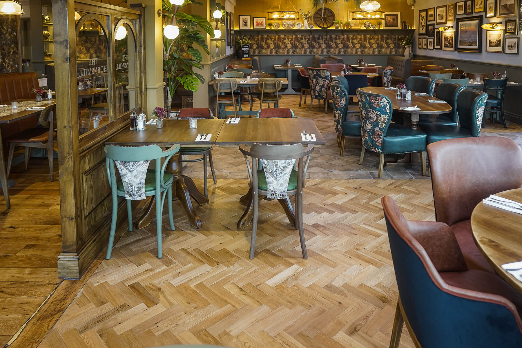 Durable wood flooring for high-traffic restaurant spaces.