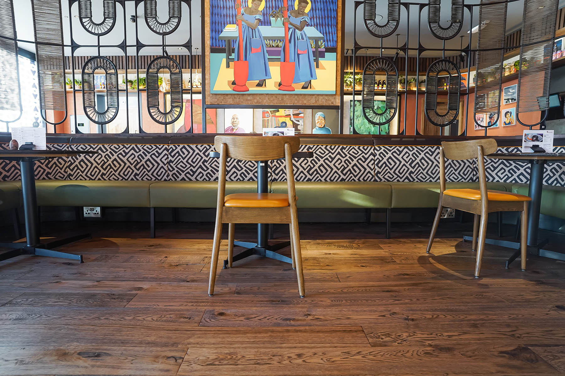 Eclectic restaurant design complemented by JackEvie flooring.