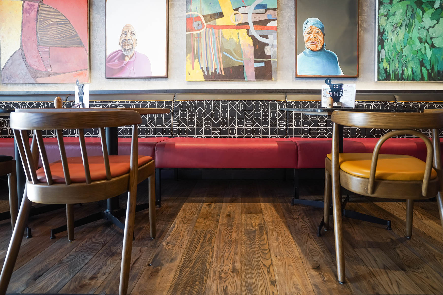 Rustic wood textures of Howden planks in restaurant design.