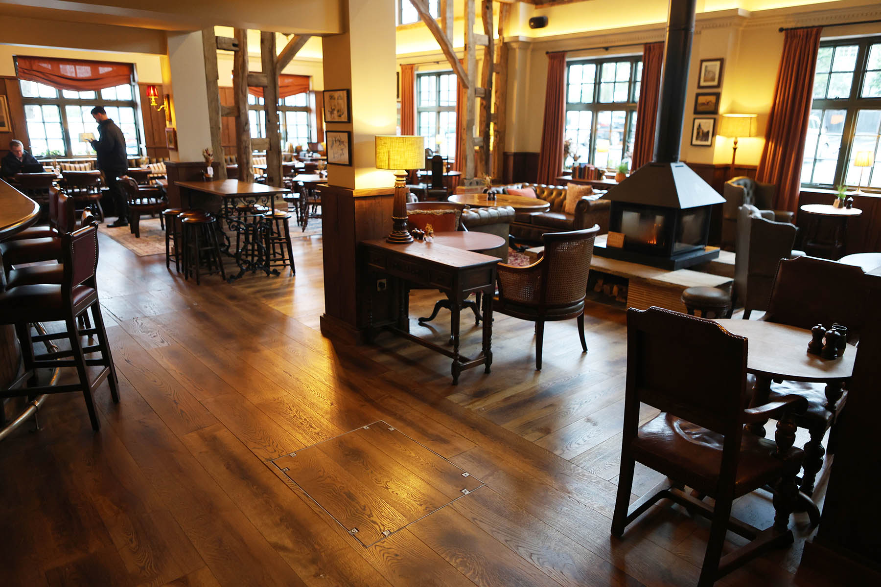 Bespoke engineered plank flooring at Tattenham Corner pub.