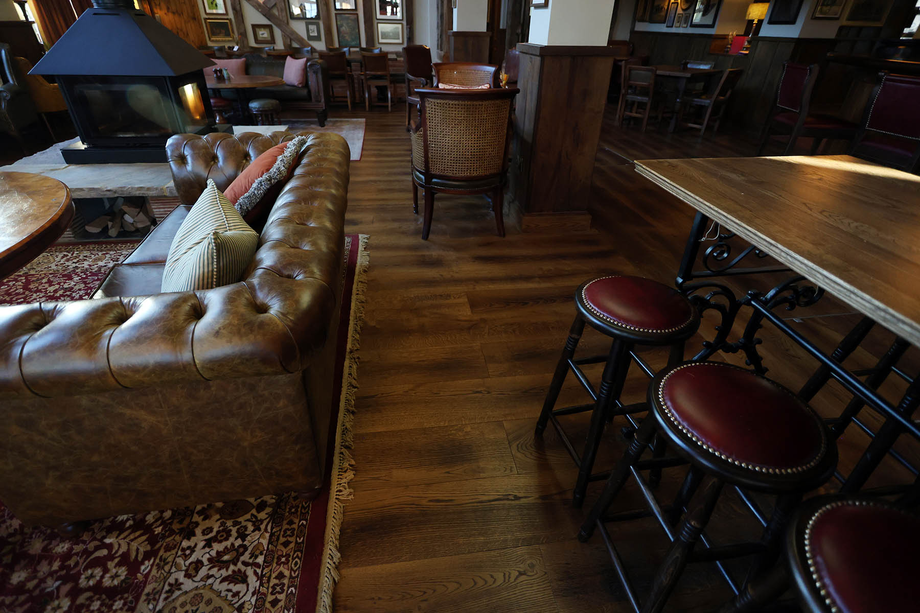 Elegant wooden flooring complementing a traditional pub interior.