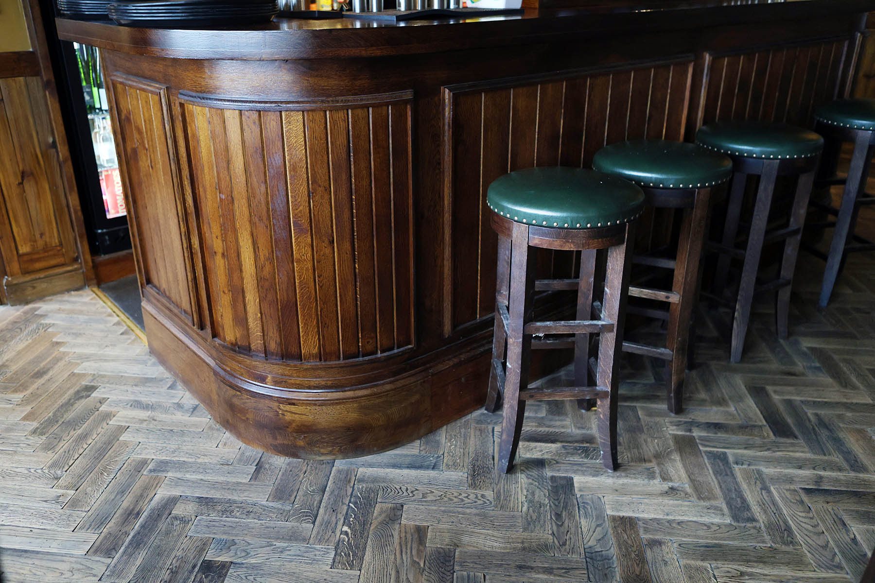 Solid oak herringbone floor blocks with a tumbled edge.