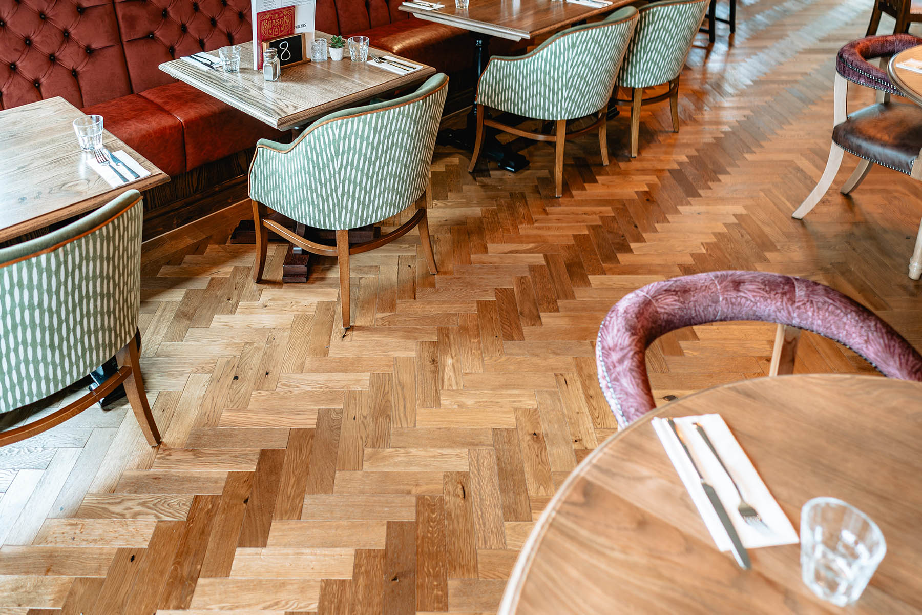 Rustic and refined oak flooring styles tying together The Bellflower’s interior.
