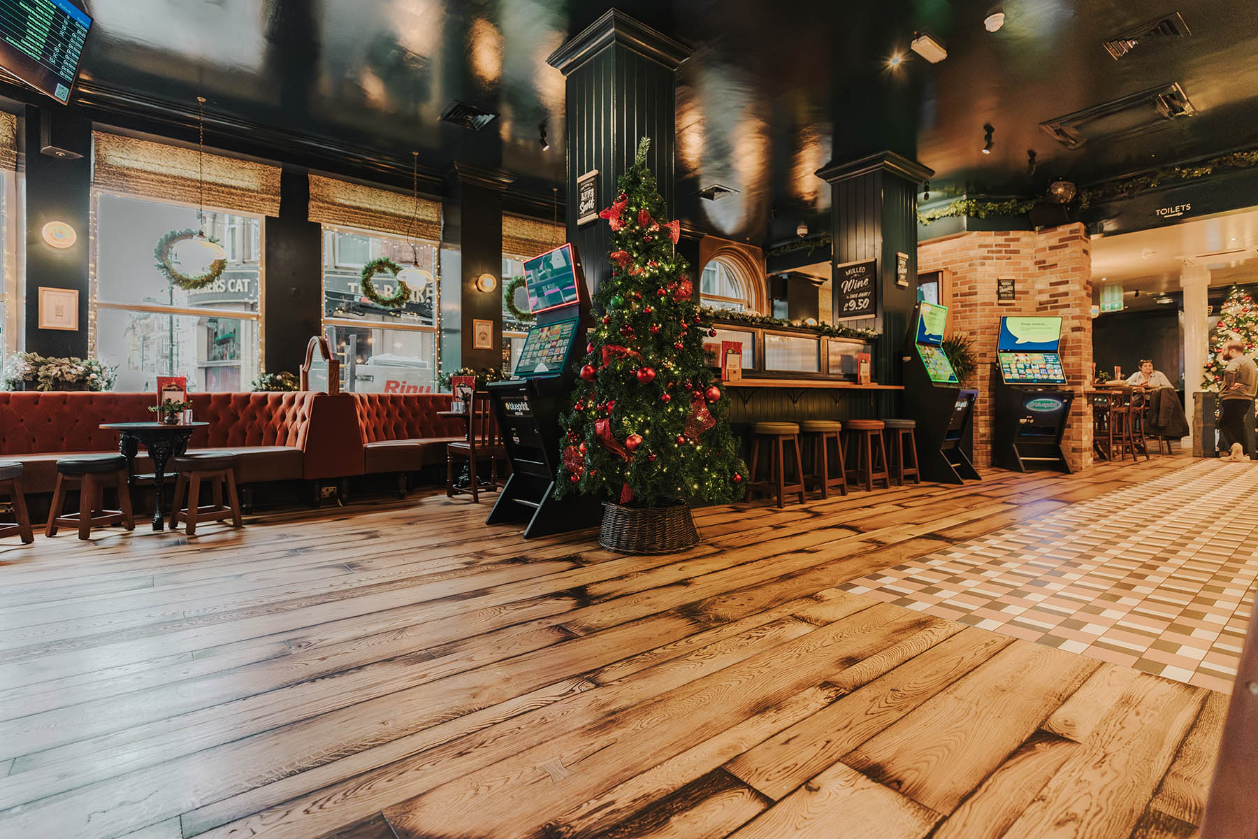 Mixed-width Lowfield Lane planks with burnt edges in The Griffin, Leeds.
