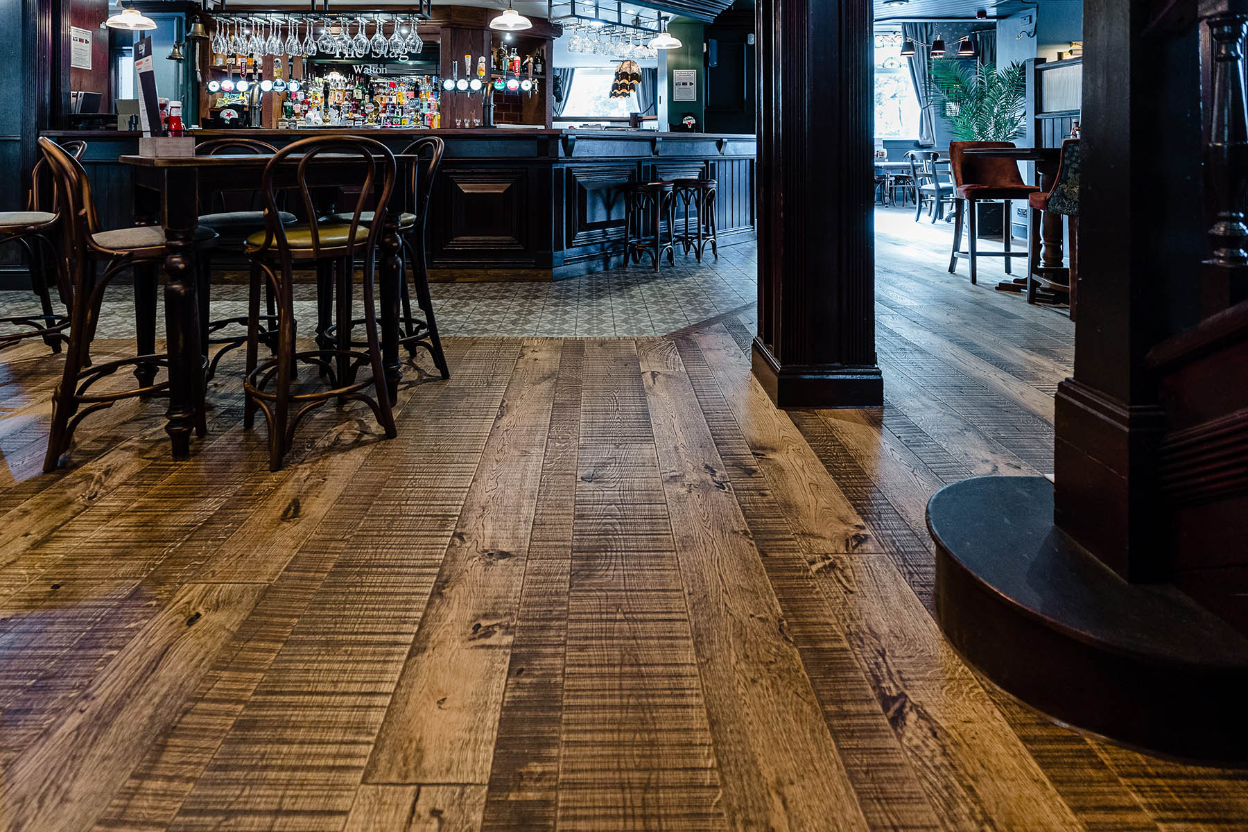 Commercial wood flooring in a pub setting